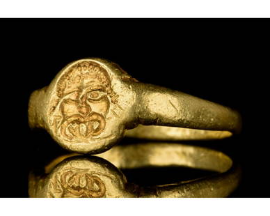 ROMAN GOLD SEAL RING WITH MEDUSA - XRF TESTED: ca. 100 AD. Roman. A fine solid gold ring with a circular hoop and circular bezel decorated with a Gorgon (also known as Medusa); fully wearable. The item has undergone X-ray fluorescence analysis to