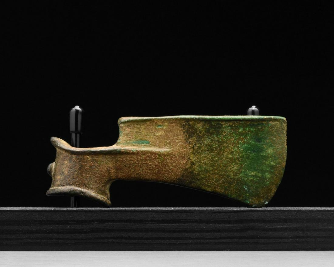 BRONZE SOCKETED AXE HEAD ON STAND (1 of 3)