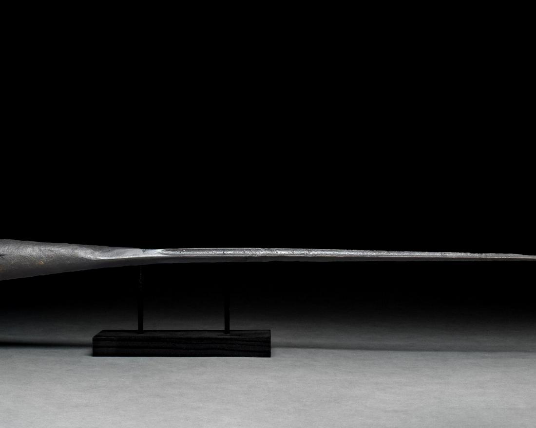 MEDIEVAL EUROPEAN LANCEHAD: Ca. 1400 AD. European. An iron lancehead with narrow lozenge-section blade, conical socket with collar to the neck. The Lance was a formidable weapon when used from horseback. Historically used by Ger