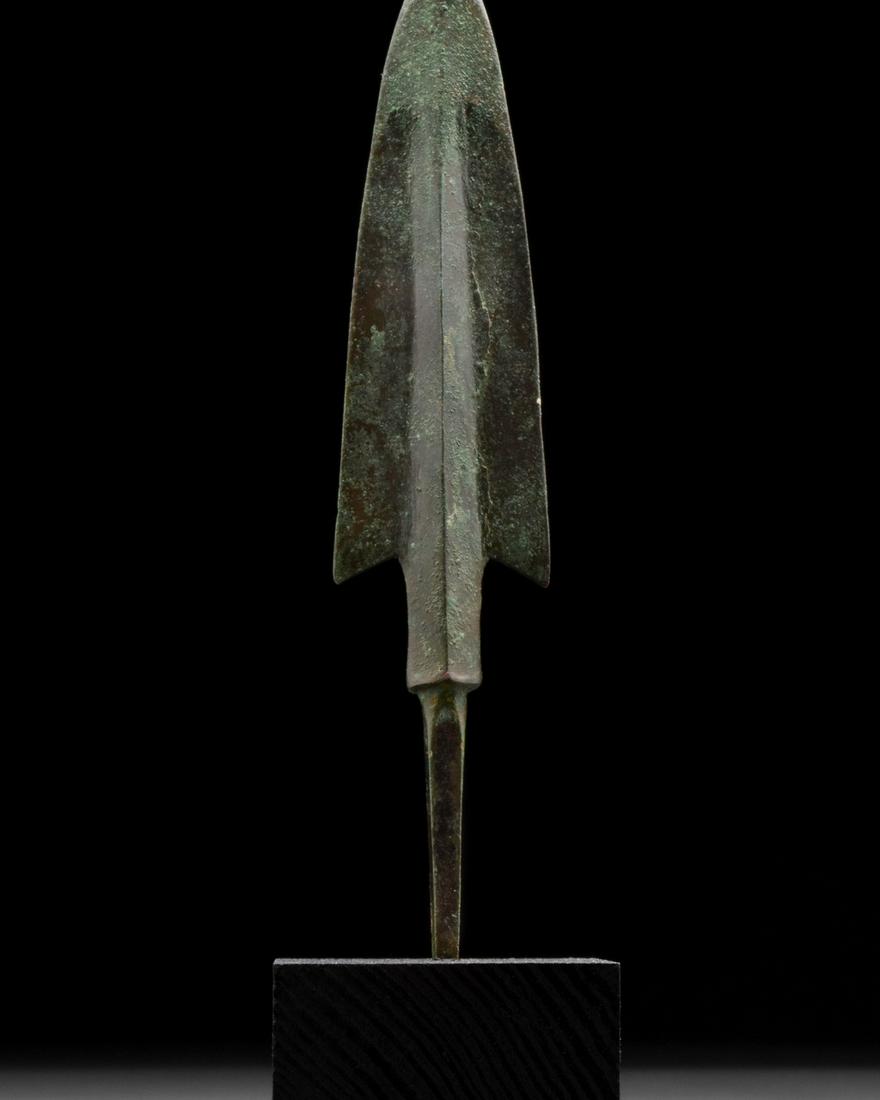 ANCIENT BRONZE SPEAR HEAD ON STAND (1 of 3)