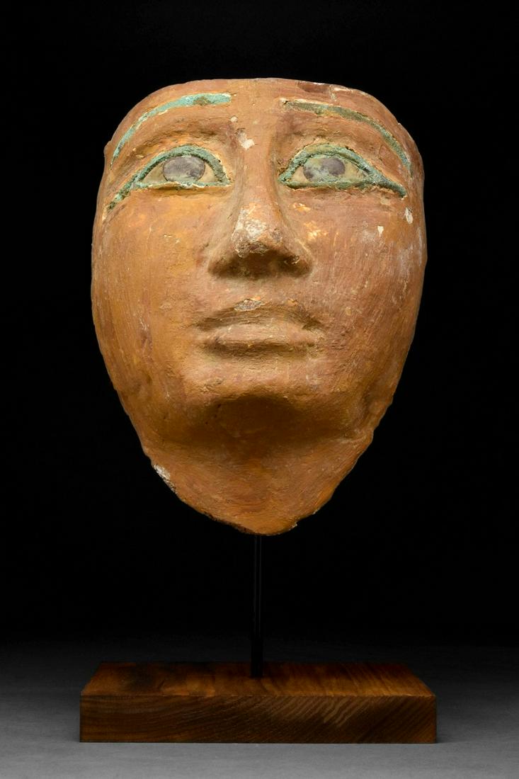AN EGYPTIAN GESSO-PAINTED WOOD MUMMY MASK (1 of 6)