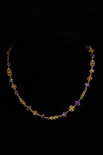 BYZANTINE GOLD NECKLACE WITH AMETHYST: Ca. 600 ADComposed of openwork disks centered by filigree Greek crosses and amethyst beads, attached to a hook and loop closure. Necklace possibly later.For similar see Christie's 11 December 2014.