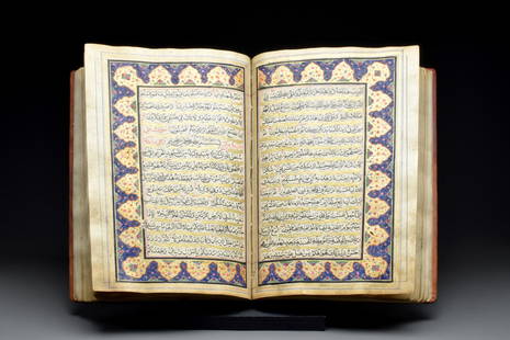 PERSIAN OR NORTH INDIAN QURAN: Persia or North India, Ca. 19th-20th century AD A Persian or Indian Quran bound in a detailed tooled leather cover.Size: L:322mm / W:210mm ; 2.33kgProvenance: Private UK collection, formed since the