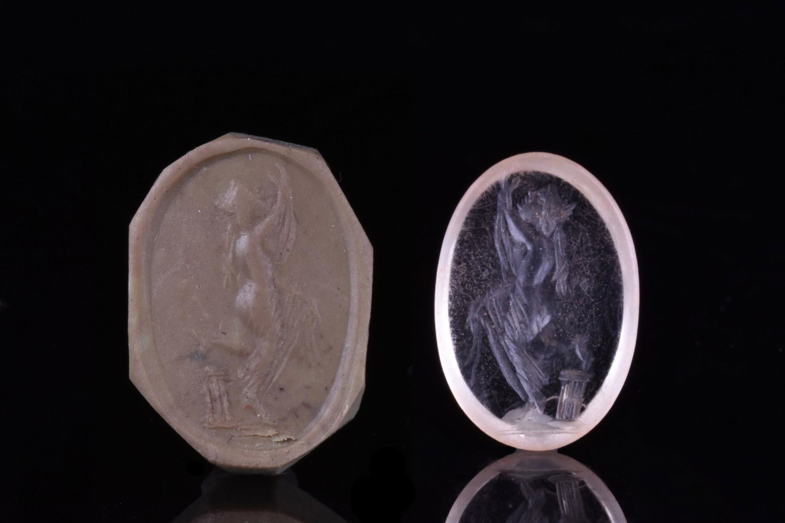 HELLENISTIC ROCK CRYSTAL RING STONE WITH APHRODITES: Ca. 400-300 BC.A rock crystal ring stone depicting standing goddess Aphrodites, partially draped and leaning her foot on a short column. Venus was the god of love, beauty, desire, sex, fertility, pros