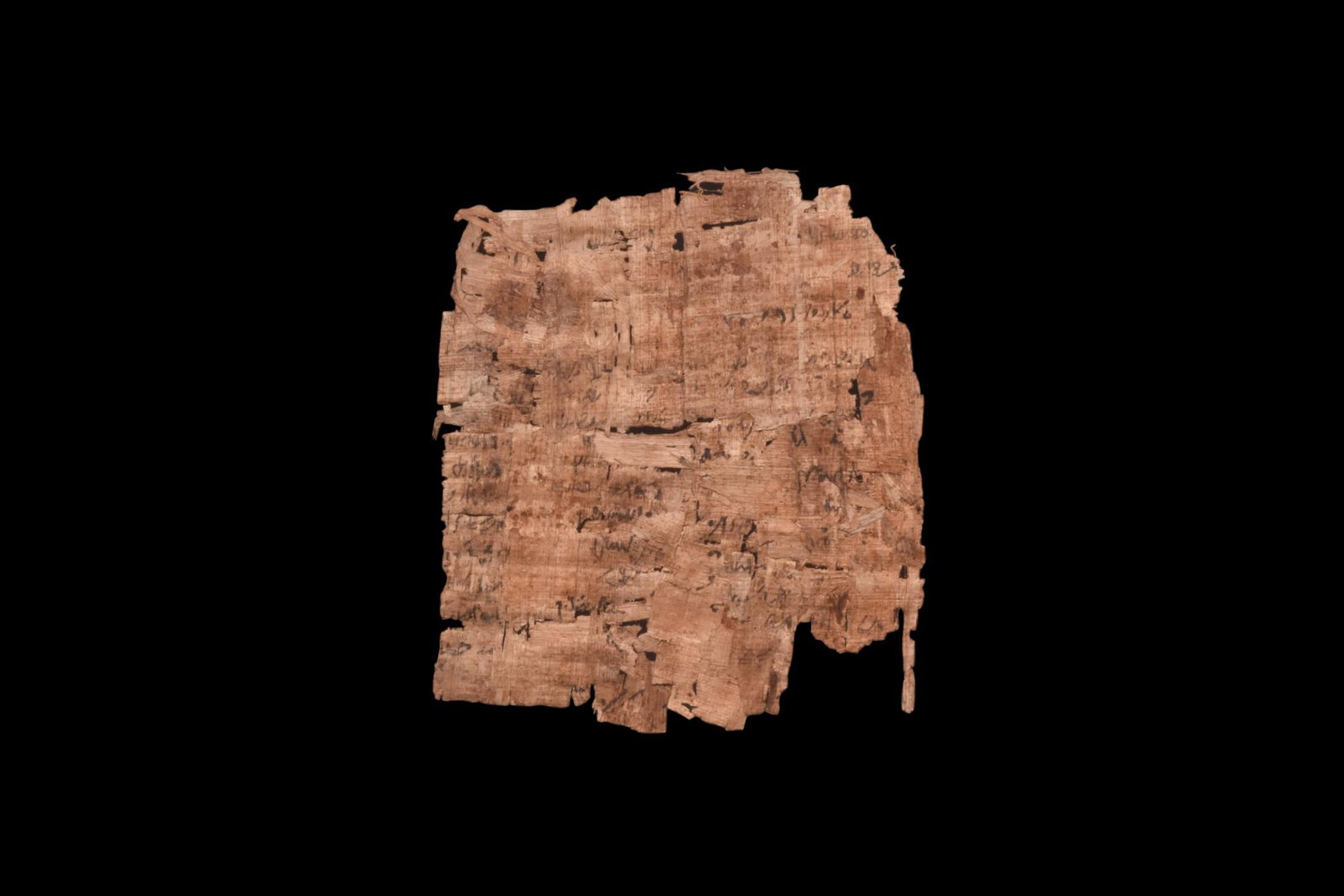 EGYPTIAN PAPYRUS FRAGMENTS WITH DEMOTIC TEXT: Roman Period, Ca. 31 BC. A sheet of papyrus inscribed with demotic text in black ink. Demotic was used specifically for writing detailed documents, like accounting, literacy, and religious texts, and 