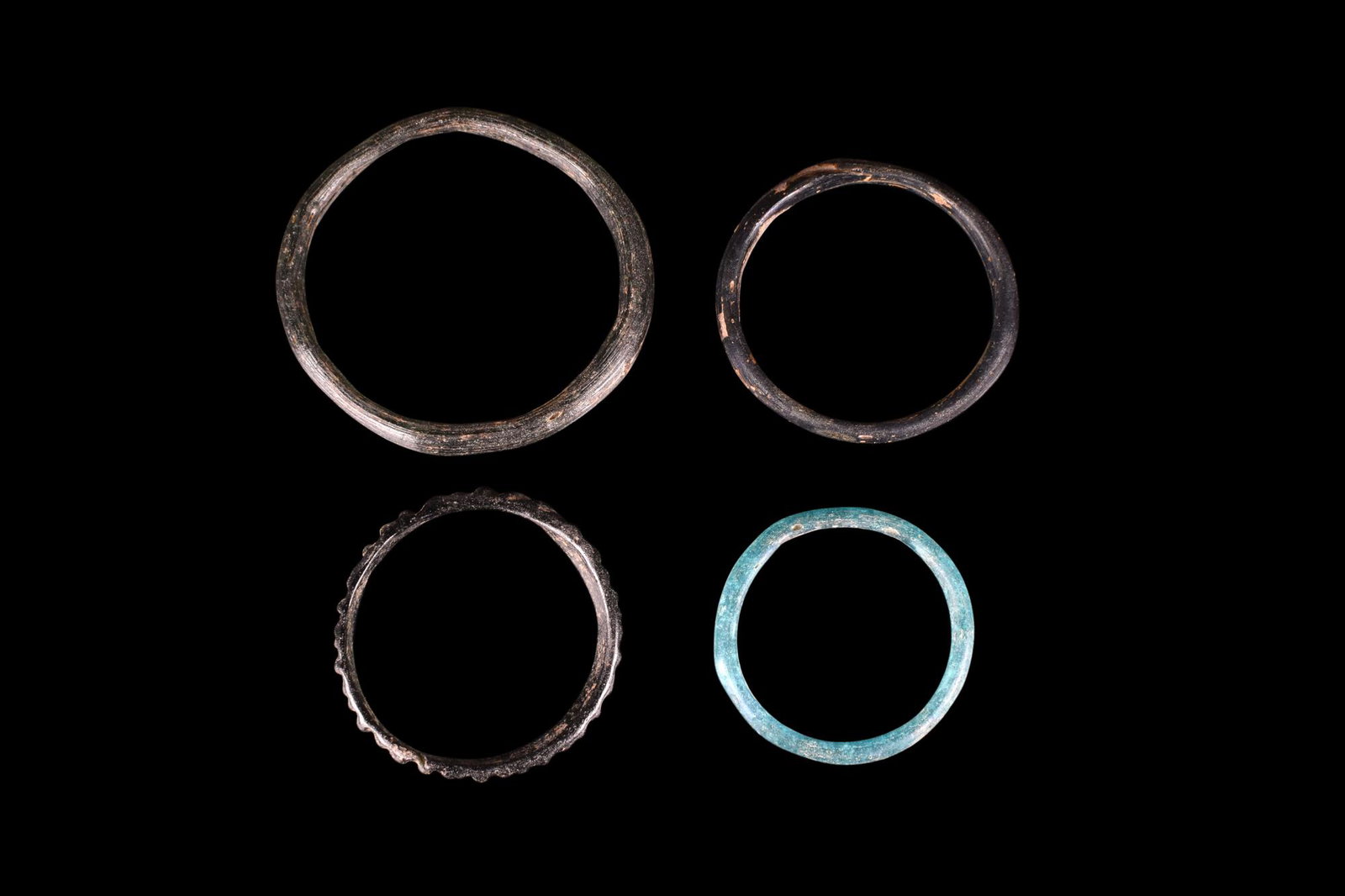 COLLECTION OF FOUR ROMAN GLASS BRACELETS (1 of 3)
