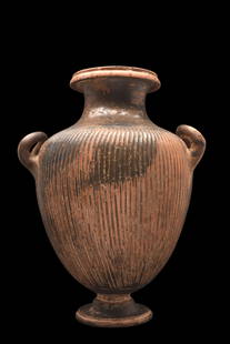 GREEK BLACK-GLAZE RIBBED HYDRIA: Ca. 350 BC. A black-glazed pottery hydria with a characteristic bulbous body with a short, splayed foot, a funnel-shaped neck decorated with a band of laurel, dotted ovolo on the rim, and three