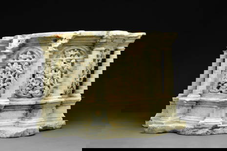 BYZANTINE MARBLE RELIQUARY WITH PILLARS: Ca. 300-900 AD. A drum-shaped marble chest in the form of a tholos surrounded by eight columns with simple capitals, arcades between the pillars with elegant openwork foliate tracery; each tiered