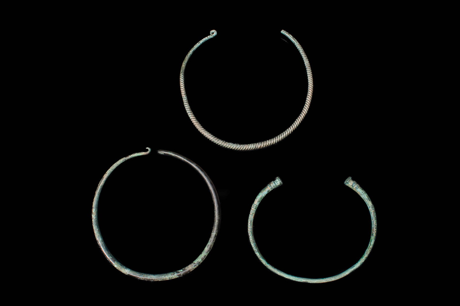 THREE CELTIC BRONZE TORQUES (1 of 2)