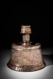 A MAMLUK GILDED BRONZE CANDLESTICK