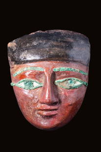 EGYPTIAN WOODEN MASK WITH INLAID EYES AND ORIGINAL PIGMENT: Late Period, Ca. 664 - 332 BC. A large, finely carved wooden sarcophagus mask. It is carved from cedar and covered with gesso painted in red pigment. The idealised facial features include a long,
