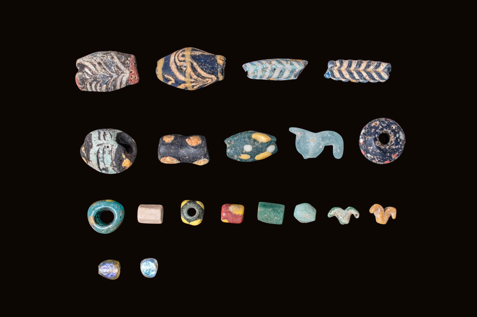 COLLECTION OF PHOENICIAN GLASS BEADS (1 of 2)