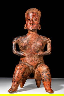 NAYARIT LARGE SEATED FEMALE: Ca. 100 BC - 250 AD. A large reddish, orangeware pottery female figure seated on a two leg bench, holding both hands on her stomach. She bears small pointy breasts, noded shoulders and wears small ear