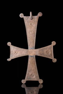 HUGE CRUSADERS ERA BRONZE CROSS PENDANT: Ca. AD 900 - 1100. A bronze cross-shaped pendant decorated with a crucified Christ, framed by a moulded relief border. At the top is a circular suspension loop for attachment to a chain or cord. This