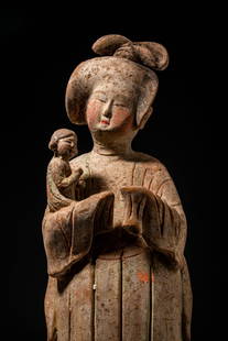 CHINESE TERRACOTTA FAT LADY HOLDING A CHILD - TL TESTED: Tang Dynasty, Ca. AD 618 - 907. A terracotta court lady holding a child. She stands upright with hands clasped to her chest, cradling a small child within voluminous sleeves on her right arm. Her full