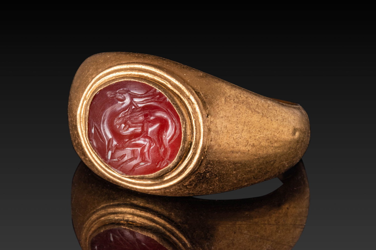 ROMAN INTAGLIO DEPICTING A WOLF ATTACKING A DEER IN HIGH KARAT GOLD RING (1 of 3)