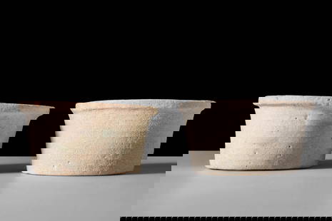 PAIR OF EGYPTIAN FAIENCE OFFERING CUPS: Late Period, Ca. 664 - 30 BC. A pair of faience offering cups with slightly flaring profiles and everted rims.For similar see: MET museum Object Number: 26.7.1015Size: 45-48mm x 22-24mm; Weight: 45gPr