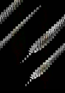 EARLY GREEK / BRONZE AGE BRONZE SWORD: Ca. 900 - 800 BC. A cast bronze sword with a long blade tapering to a sharp point. A pronounced central midrib runs along the length, flanked by two narrow ribs extending nearly to the tip. The blade