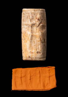 GREEK PERIOD WHITISH STONE CYLINDER SEAL WITH TWO MALE FIGURES AND THE GOD AHURA MAZDA: Ca. 900 - 700 BC. A limestone cylinder seal engraved with a procession of three figures. At the centre, the winged god Ahura Mazda is flanked by two standing male figures in long garments, each depict