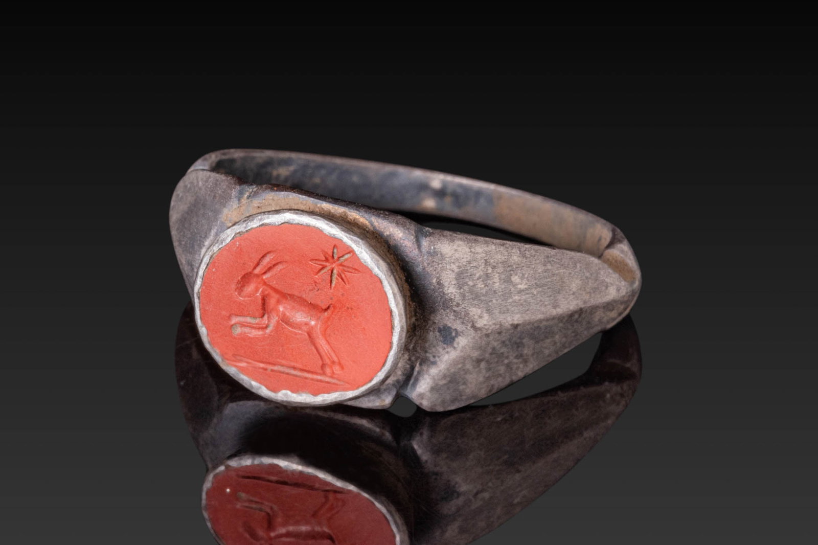 ROMAN INTAGLIO DEPICTING HARE UNDER A STAR IN SILVER RING (1 of 3)
