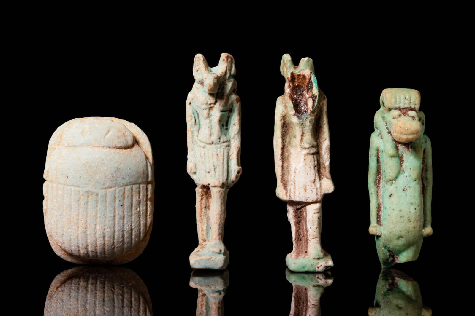 COLLECTION OF EGYPTIAN GREEN FAIENCE AMULETS (1 of 2)