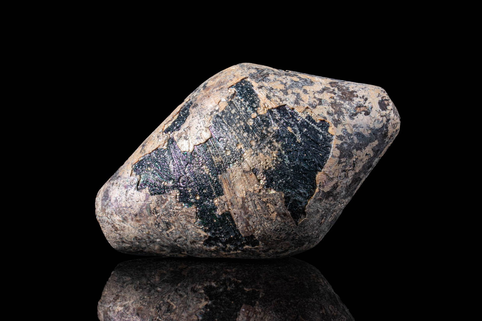 ROMAN SOLID GLASS BICONICAL STOPPER: Ca. AD 200 - 300. A dark green glass stopper with a biconical shape, tapering symmetrically to concave points at both ends, used for sealing vessels. For similar see: Sir Henry Wellcome's Museum Colle