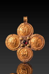 BYZANTINE HIGH KARAT GOLD CROSS WITH CENTRAL RED GARNET CABOCHON AND FOUR QUADRUPEDS: Ca. AD 600 - 800. A gold pendant in the form of a cross with rounded arms, each composed of a repoussé medallion enclosing a beaded border and a quadruped with curled tail and head turned back. A