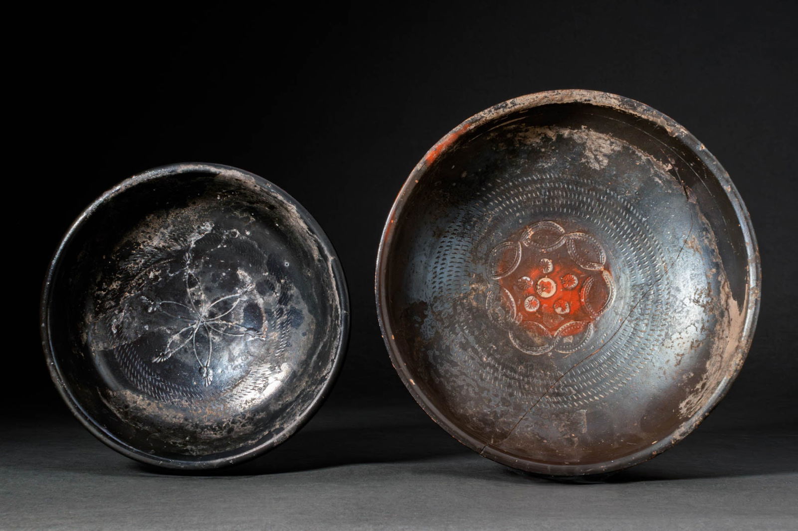 PAIR OF GREEK BLACK-GLAZED CUPS WITH STAMPED DECORATION (1 of 3)
