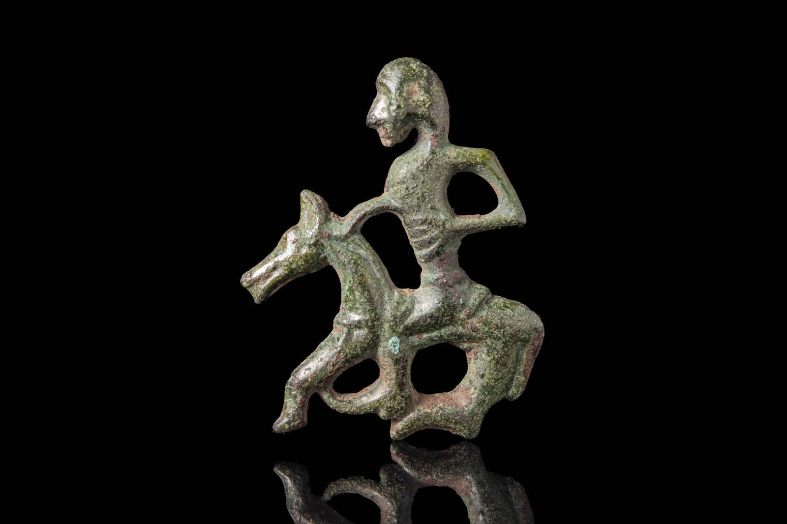 VIKING BRONZE OPENWORK APPLIQUÉ IN THE FORM OF A HORSE AND RIDER (1 of 3)