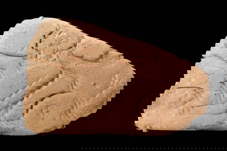 EGYPTIAN SANDSTONE RELIEF WITH PRIESTS: Amarna Period, Ca. 1353 - 1336 BC. A sandstone relief carved in sunk relief with a male figure shown in profile to the left, the long forearm raised before the chest and the body outlined by angular