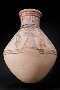 EGYPTIAN BLUE-PAINTED TERRACOTTA JAR WITH DJED PILLARS AND ANKHS: Amarna Period, Ca. 1353 - 1336 BC. A terracotta jar with a biconical body, a squat neck, and a rounded lip, decorated in red, black, and blue pigment. The neck is painted with a band of vertical