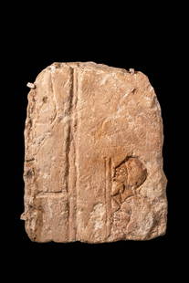 EGYPTIAN AMARNA PERIOD SANDSTONE RELIEF DEPICTING TWO WORSHIPPERS: Amarna Period, Ca. 1353 - 1336 BC. A sandstone relief fragment carved with two male worshippers in profile, facing left, each with elongated facial features characteristic of the Amarna style.For