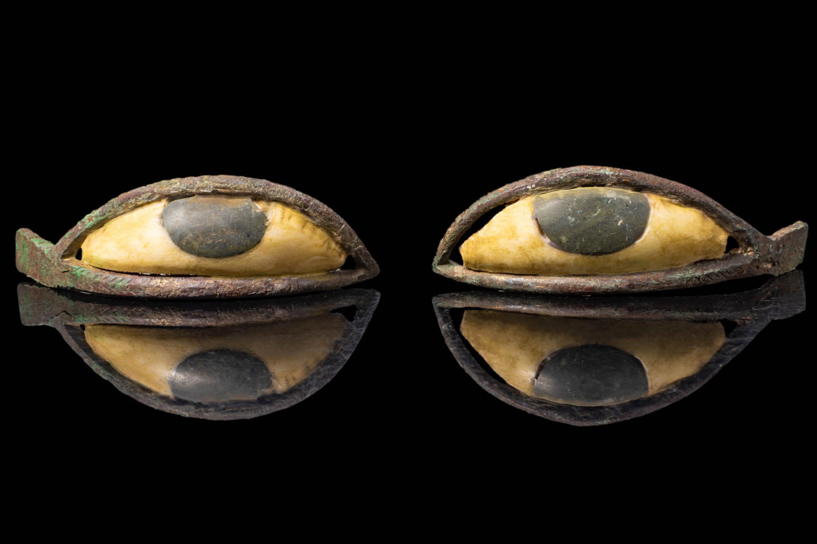 EGYPTIAN STONE AND BRONZE INLAID EYES (1 of 2)