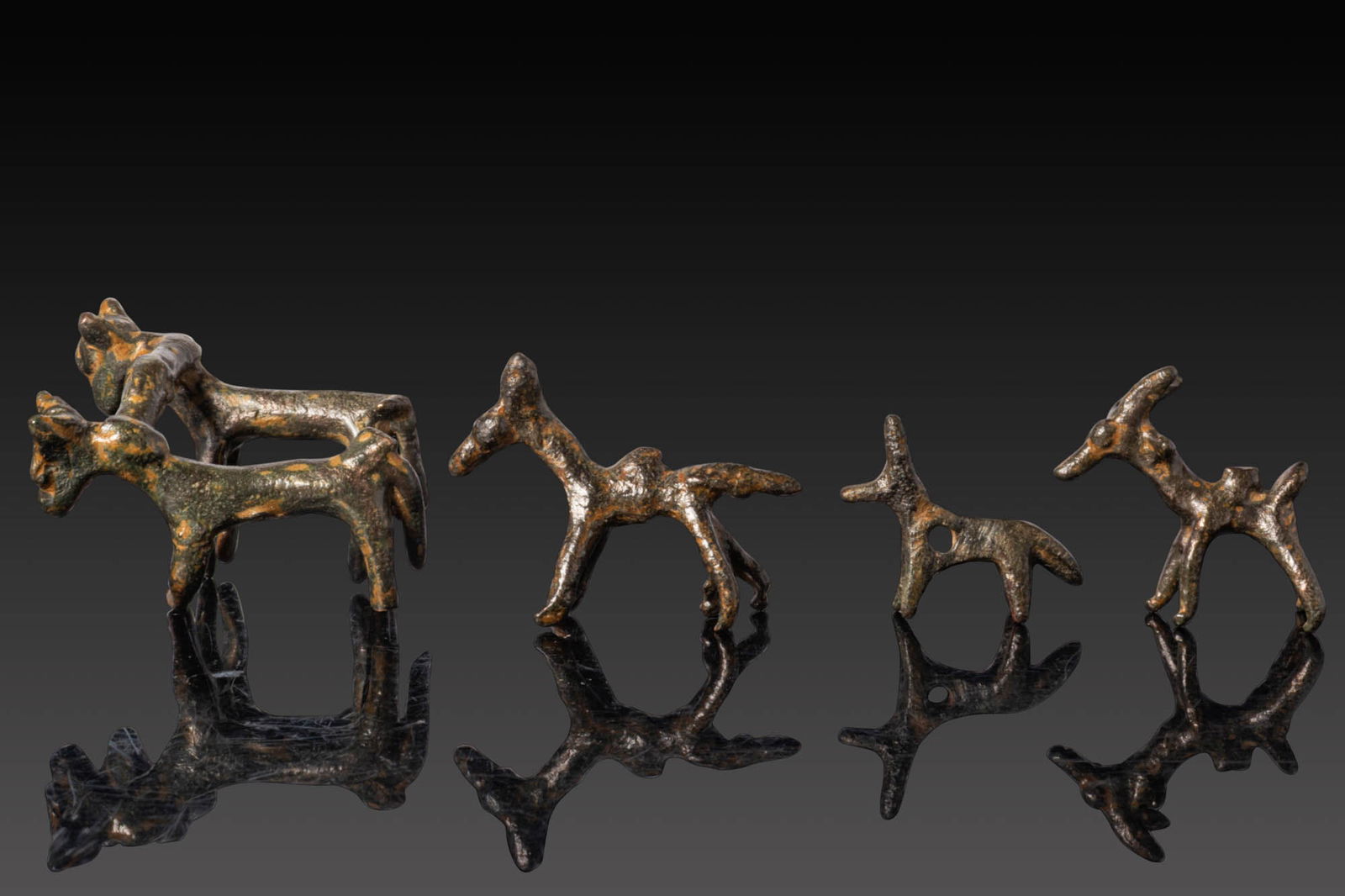 COLLECTION OF EARLY GREEK PERIOD BRONZE FIGURINES OF ANIMALS (1 of 8)