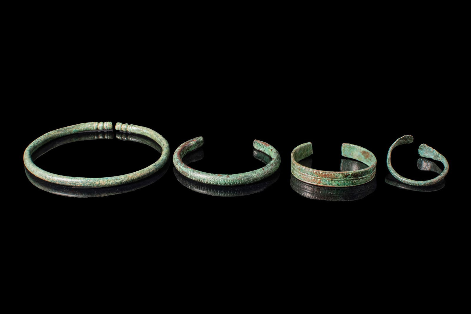 COLLECTION OF VIKING BRONZE DECORATED BRACELETS (1 of 6)