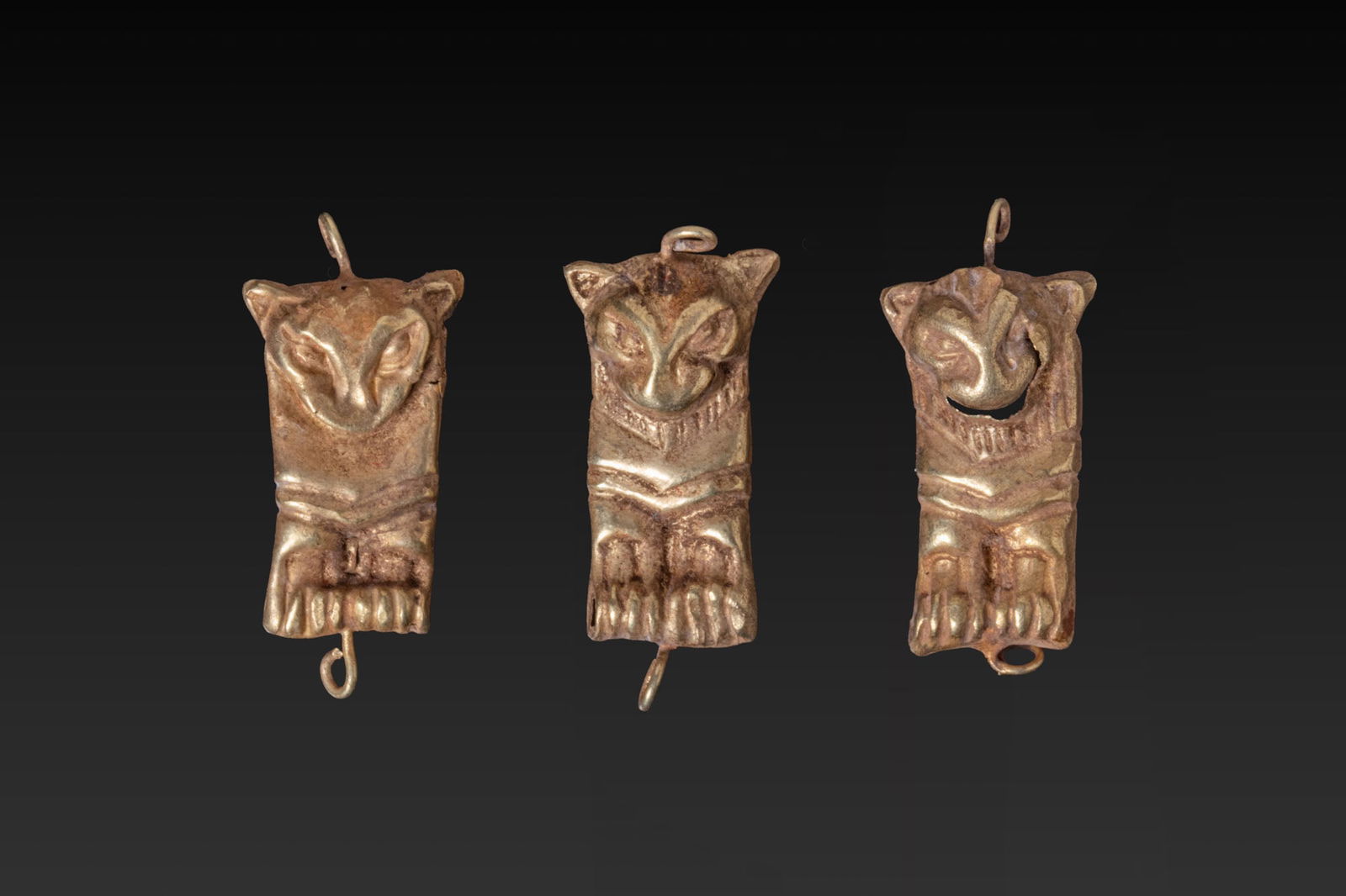 COLLECTION OF GREEK GOLD LION-SHAPED PENDANTS (1 of 2)