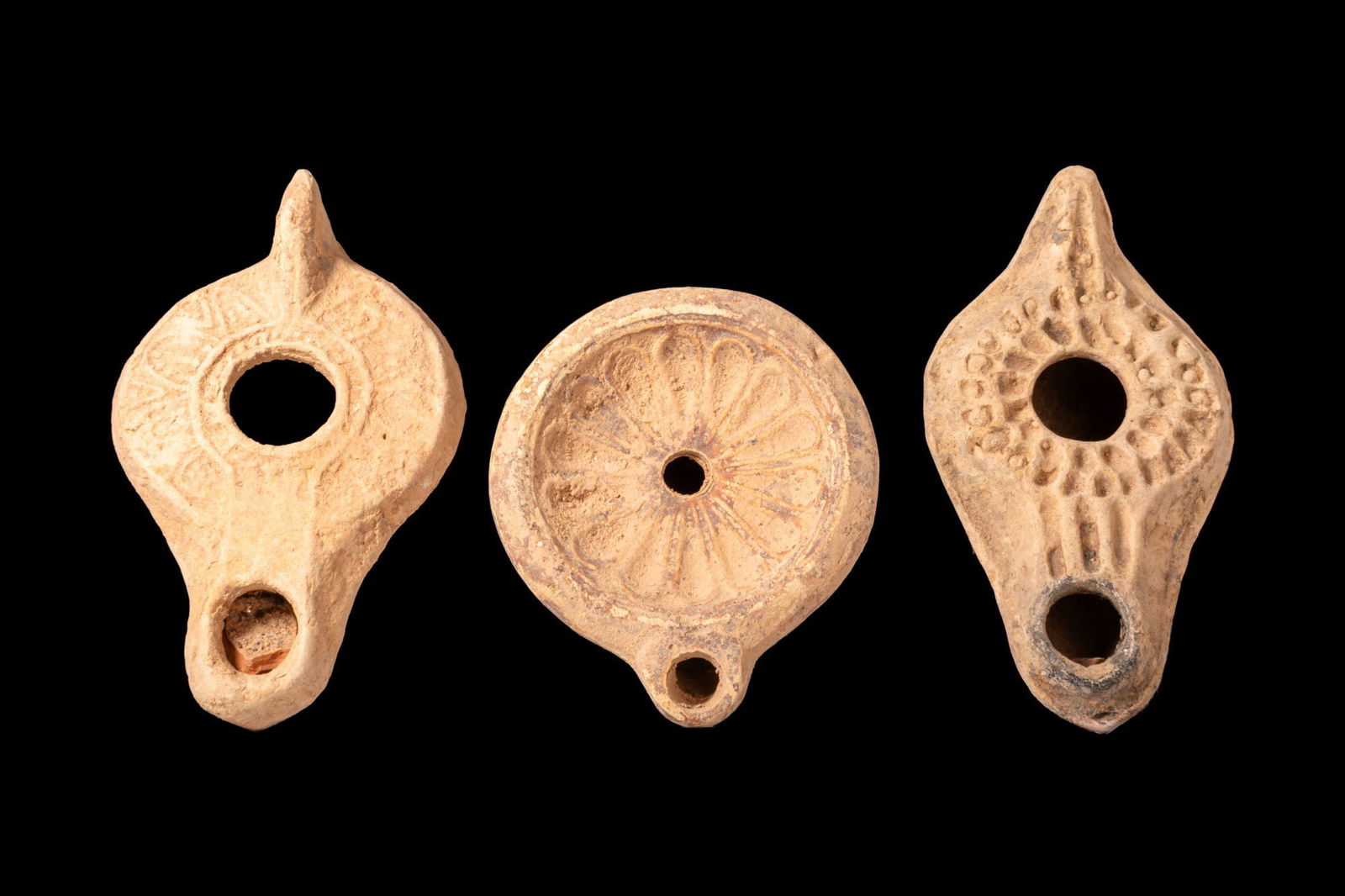 COLLECTION OF ROMAN AND BYZANTINE TERRACOTTA OIL LAMPS WITH MOULDED DECORATION (1 of 3)