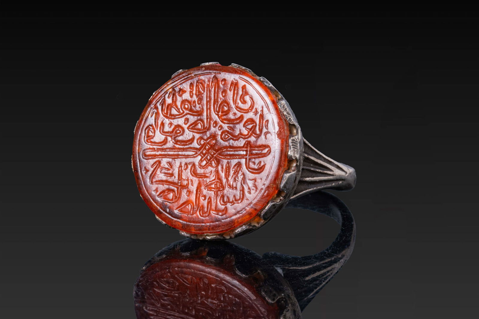 QAJAR SILVER RING WITH CARNELIAN INSCRIBED INTAGLIO (1 of 3)