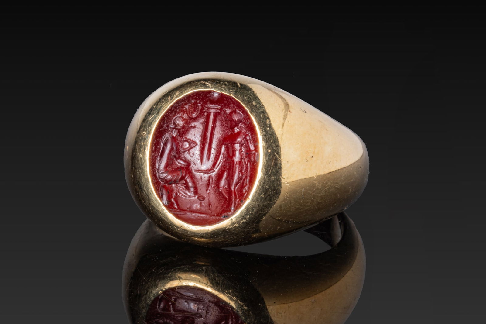 ROMAN CARNELIAN INTAGLIO OF DEITIES AND INSCRIPTION IN HIGH KARAT GOLD RING (1 of 3)