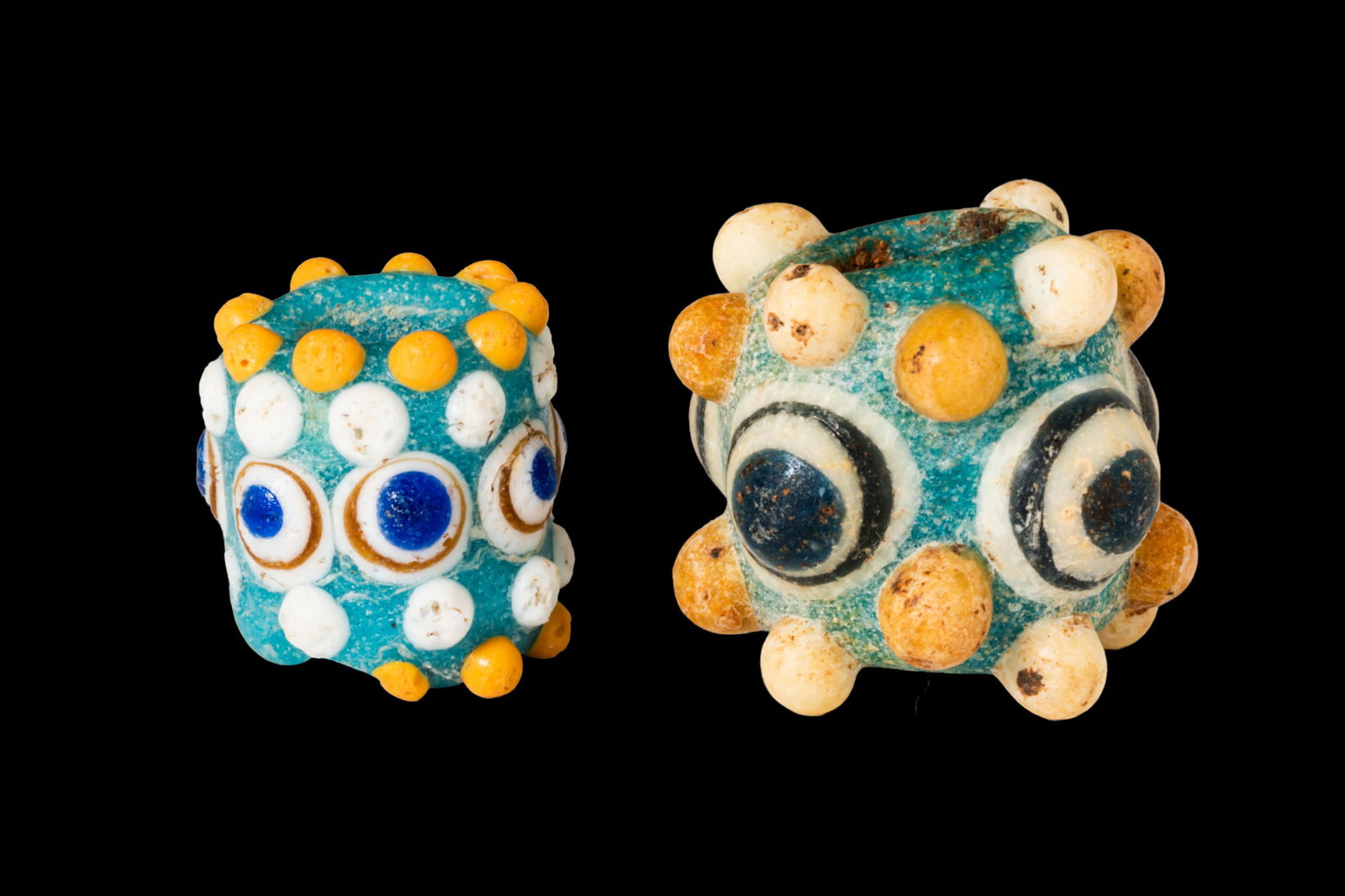 PAIR OF PHOENICIAN EYE BEADS WITH KNOB PROJECTIONS (1 of 4)