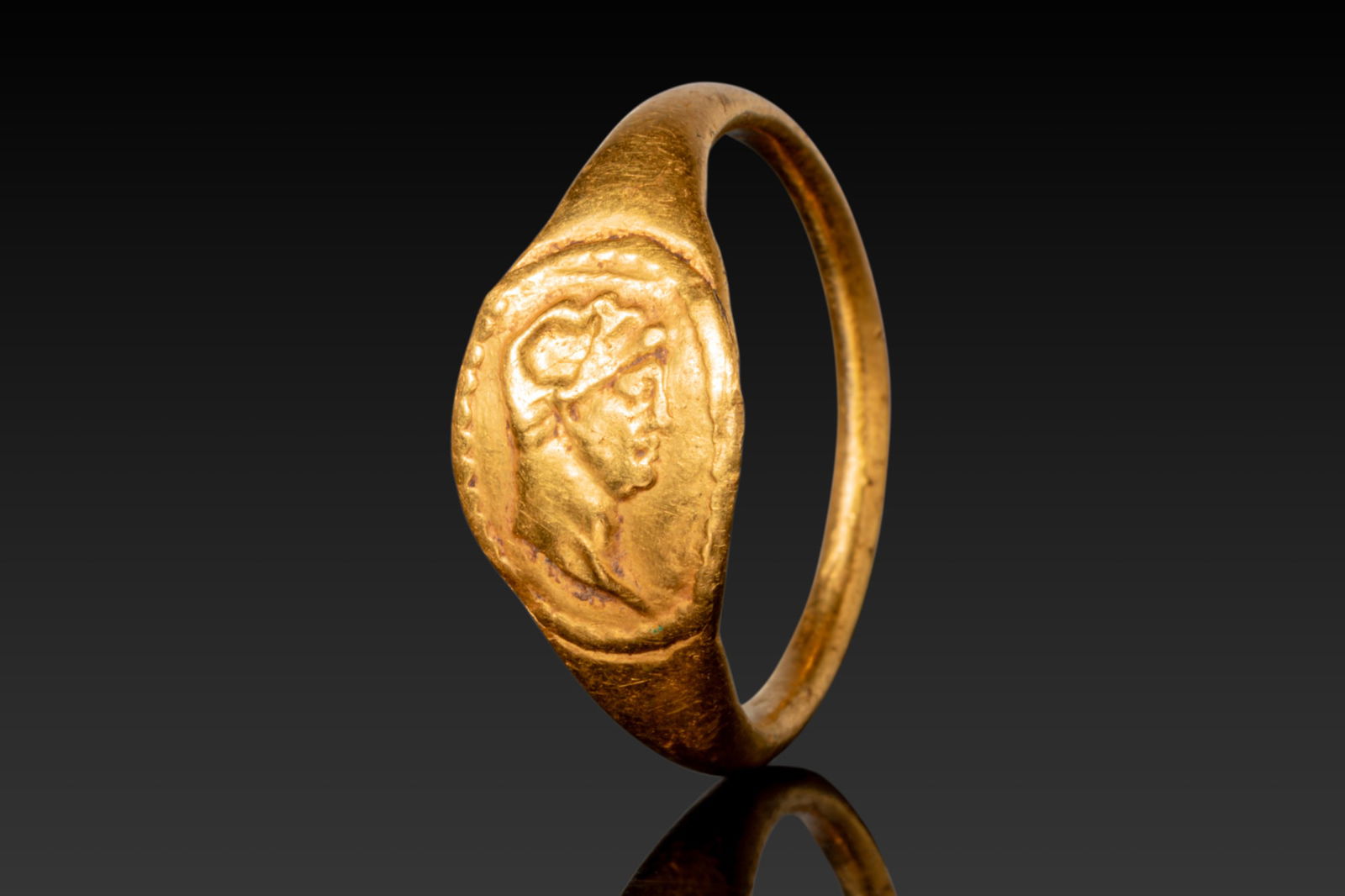 HELLENISTIC HIGH KARAT GOLD RING WITH RULER (1 of 3)
