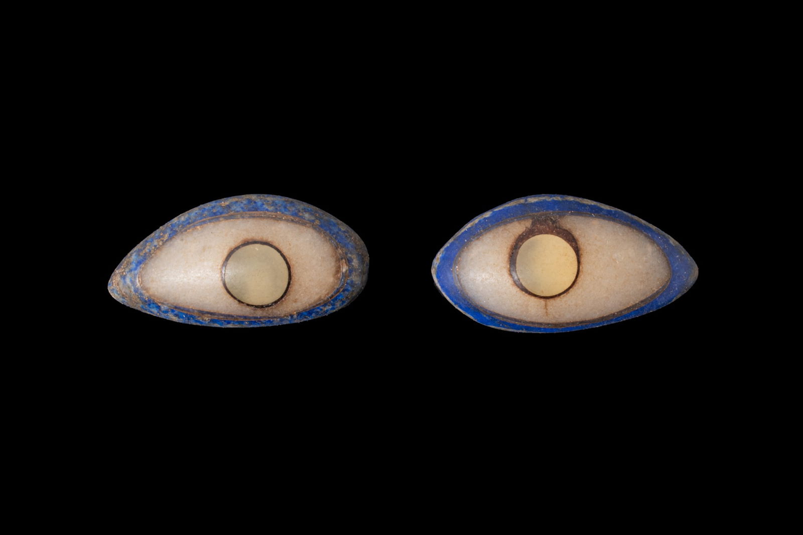 PAIR OF EGYPTIAN GLASS AND LAPIS LAZULI EYE INLAYS (1 of 2)