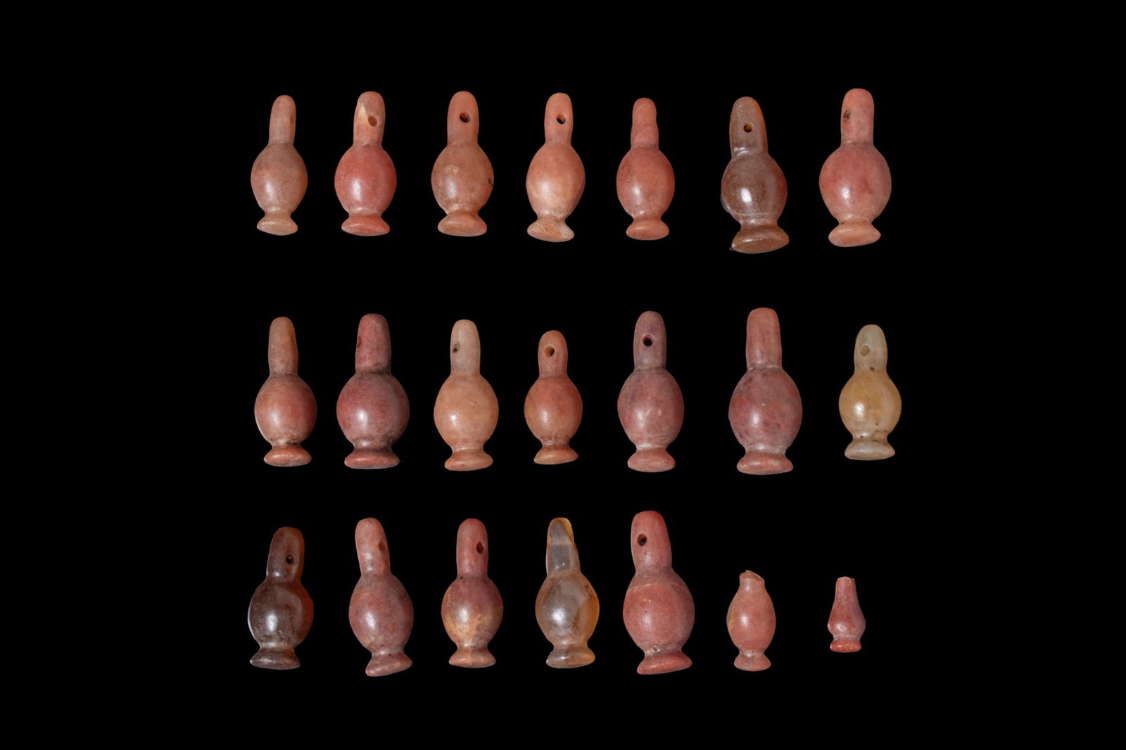 COLLECTION OF EGYPTIAN CARNELIAN POPPY BEADS (1 of 2)