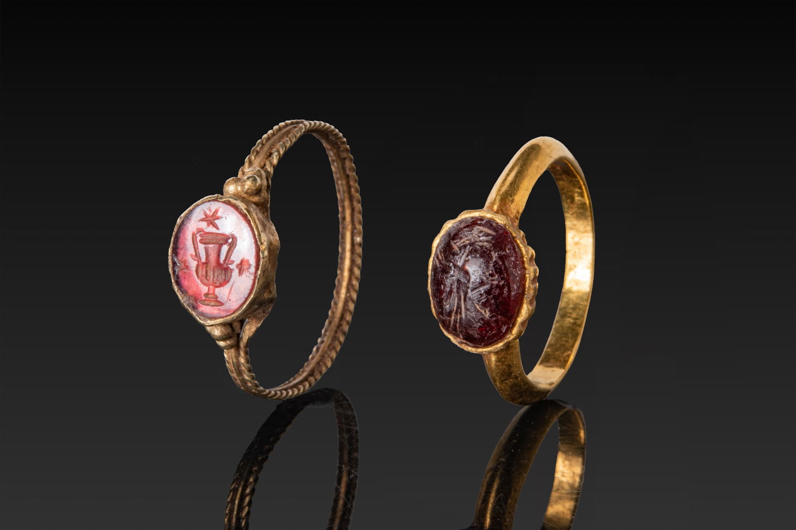 PAIR OF LATE ROMAN GOLD INTAGLIO RINGS (1 of 3)