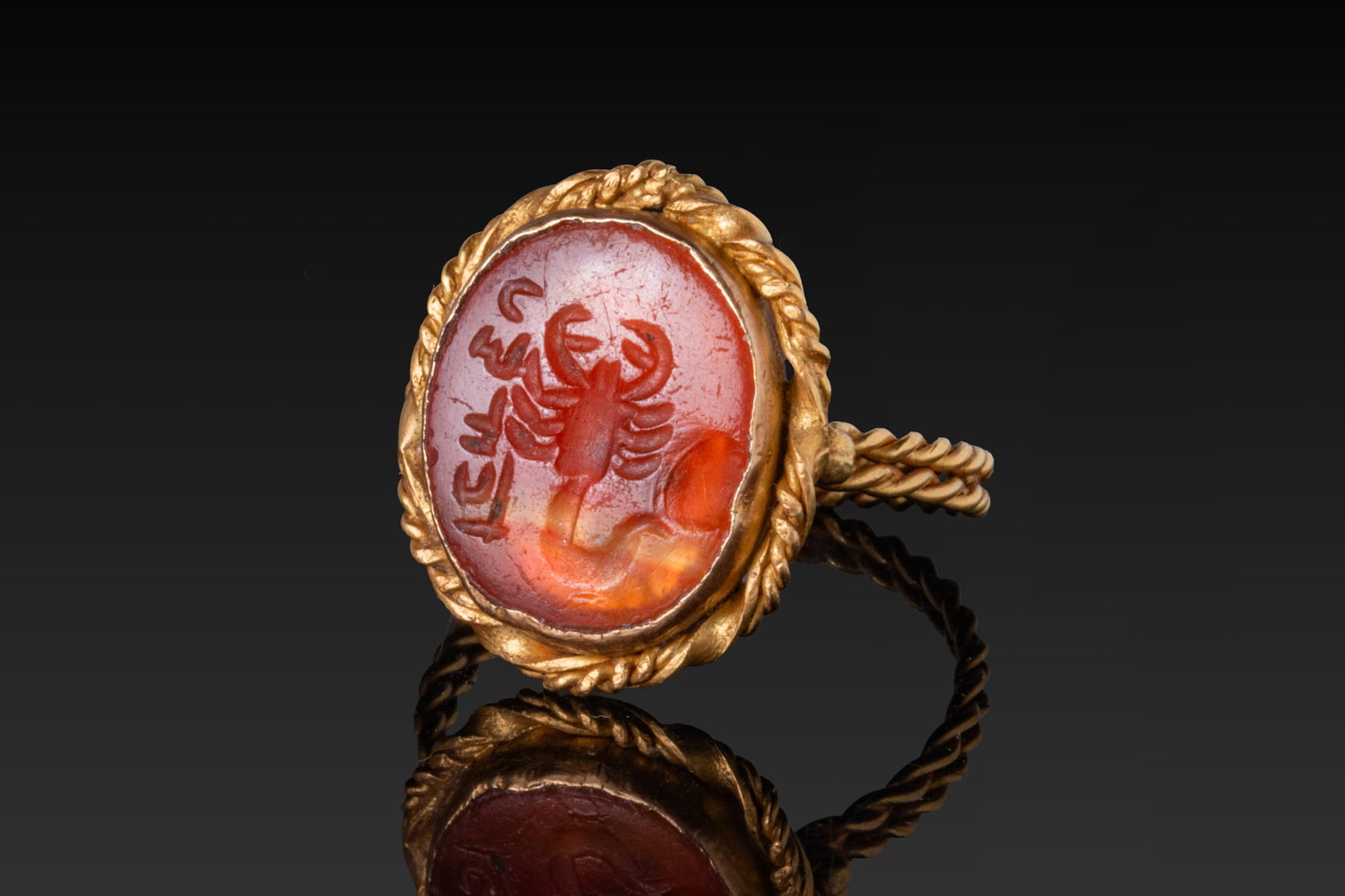 SASANIAN CARNELIAN INTAGLIO WITH SCORPION AND INSCRIPTION IN HIGH KARAT GOLD RING (1 of 4)