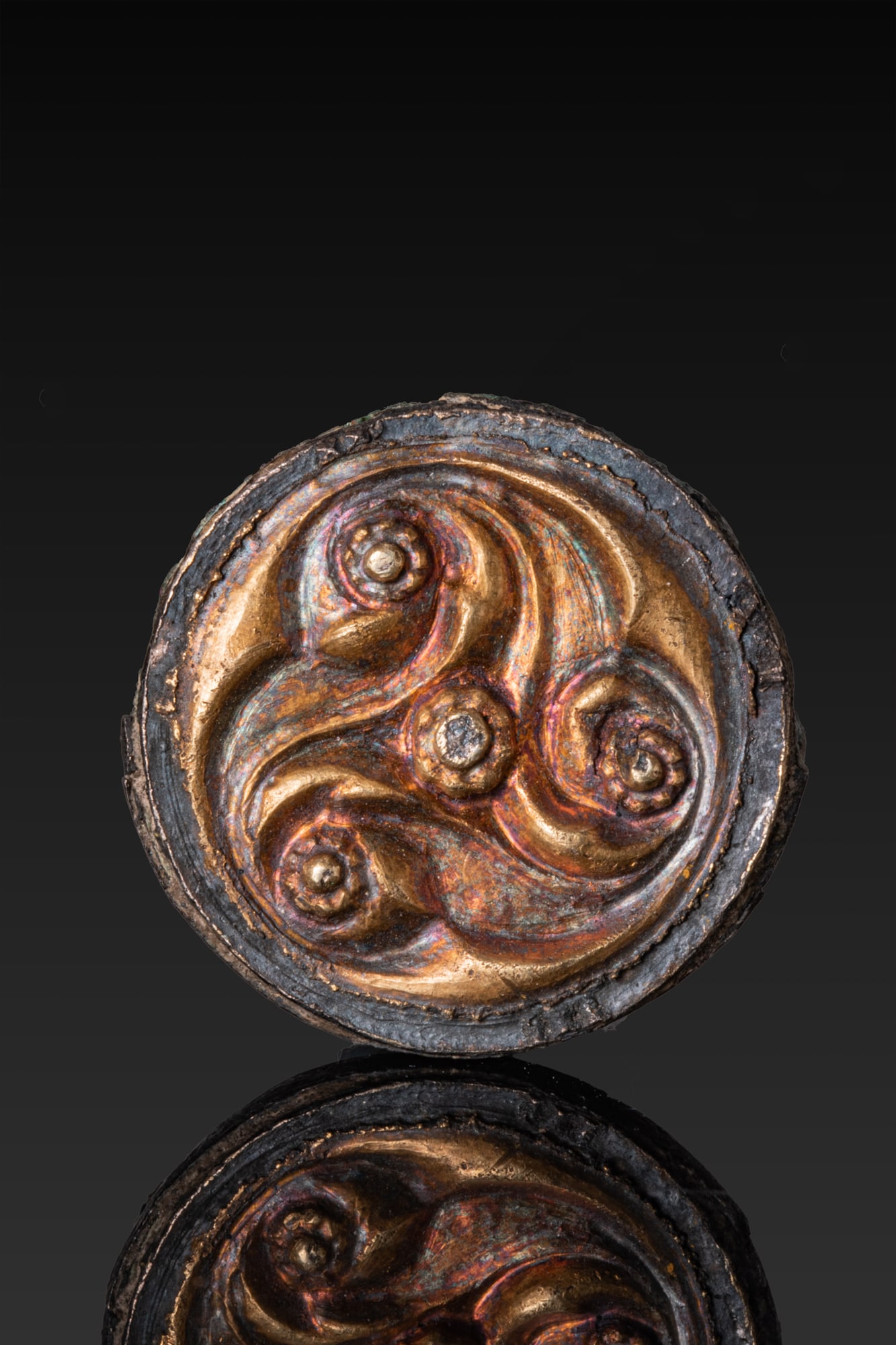 CELTIC GILT-BRONZE DISC BROOCH WITH TRISKELE MOTIF (1 of 3)