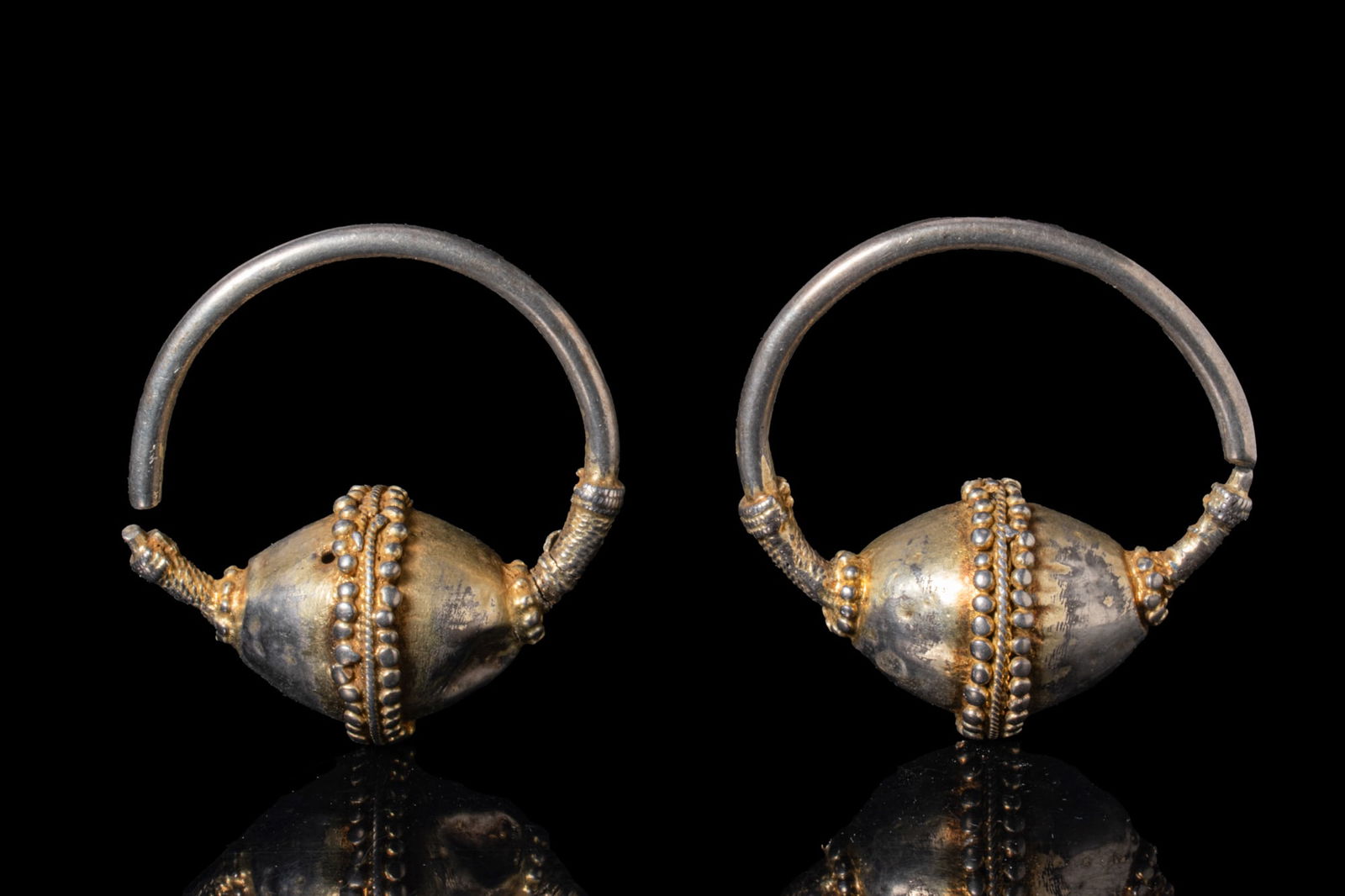 MATCHED PAIR OF VIKING PERIOD SILVER-GILT EARRINGS (1 of 3)