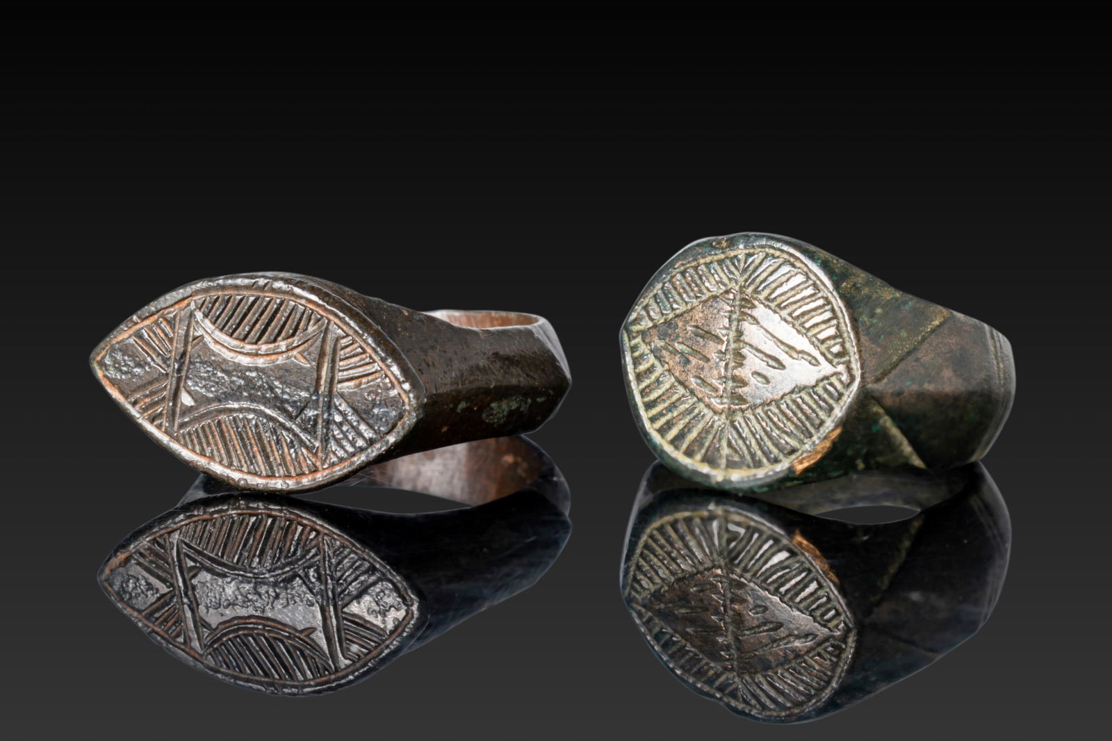 PAIR OF MEDIEVAL BRONZE FINGER RINGS WITH GEOMETRIC MOTIFS (1 of 3)