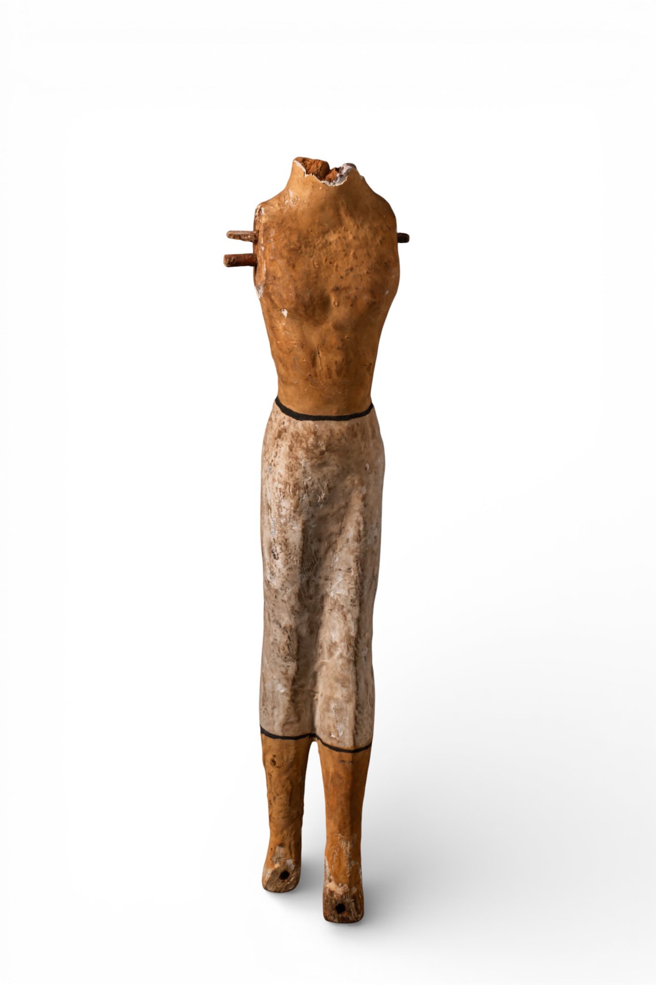 EGYPTIAN WOODEN MAN FIGURINE: Middle Kingdom, Ca. 2055 - 1790 BC A wooden male figure standing with a nude torso above a long kilt, the legs with the feet set apart, the shoulders with projecting wooden pegs for the attachment of