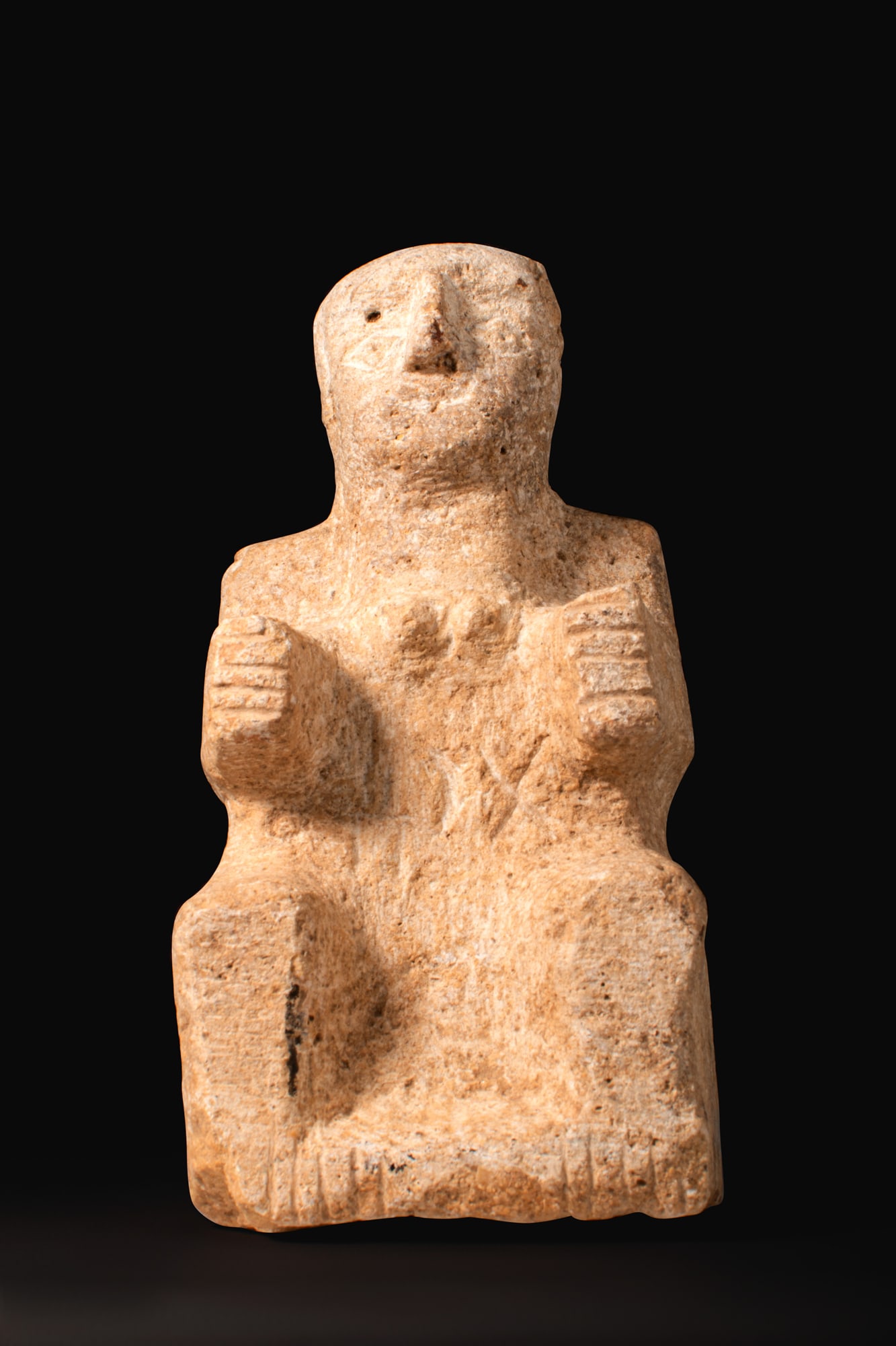 SOUTH ARABIAN STONE SEATED IDOL (1 of 4)